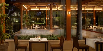 a table and chairs outside a restaurant