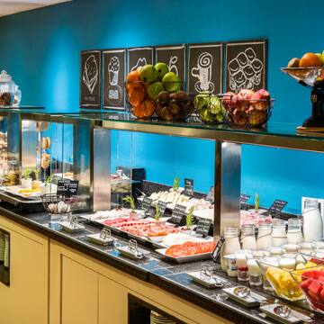 a buffet with different types of food on shelves