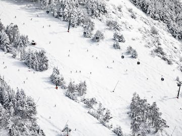 a group of people skiing on a snowy mountain