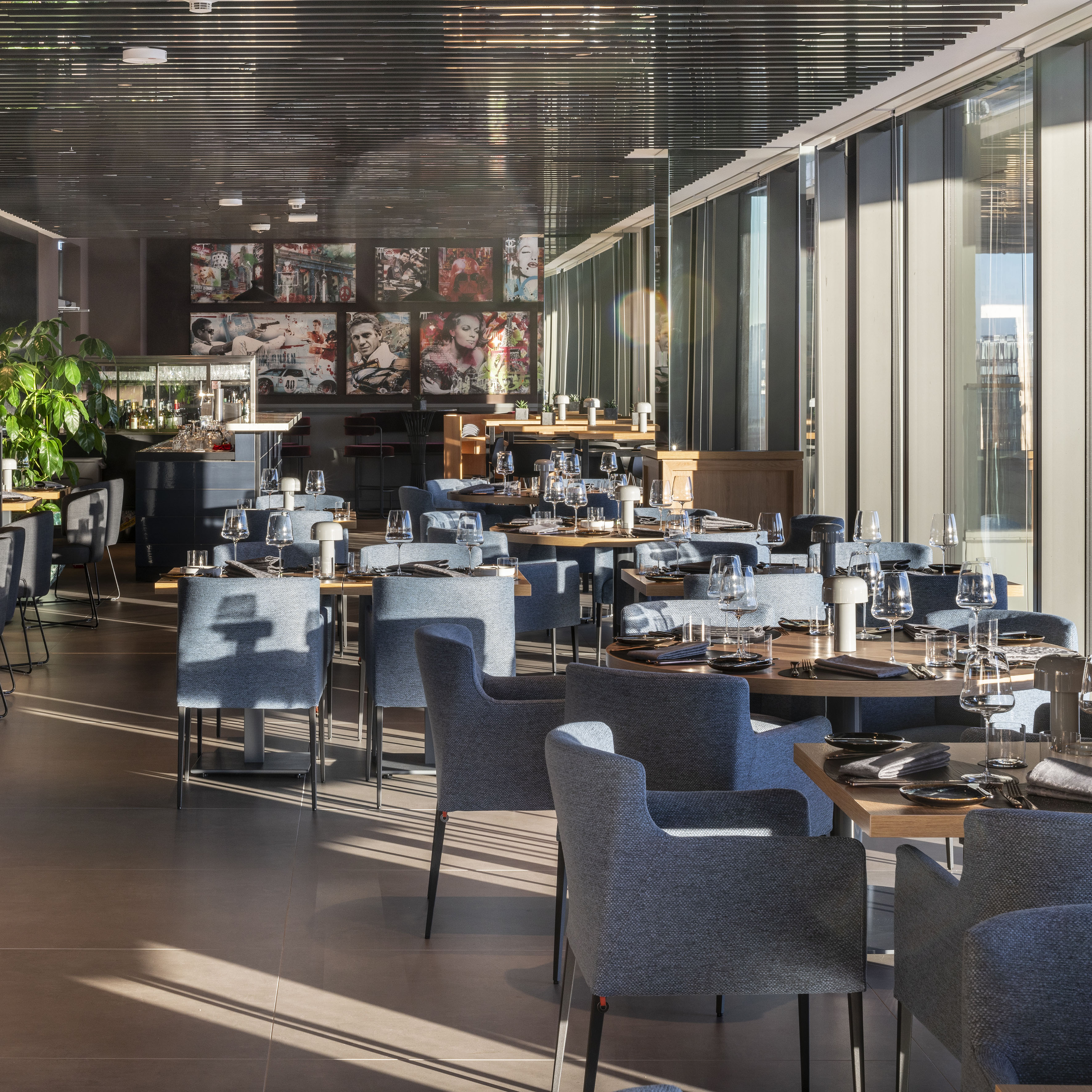 a restaurant with tables and chairs