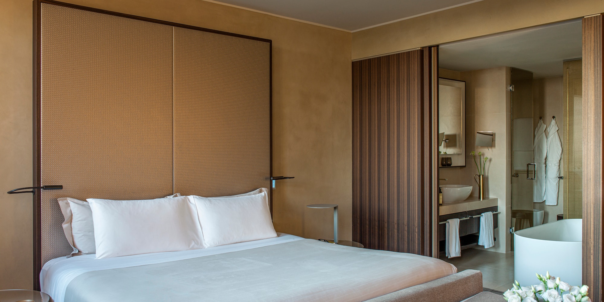 a bed in a hotel room