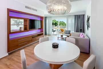 a room with a table and chairs