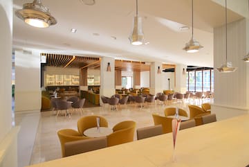 a room with tables and chairs