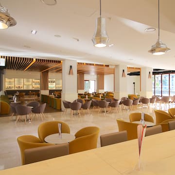 a room with tables and chairs