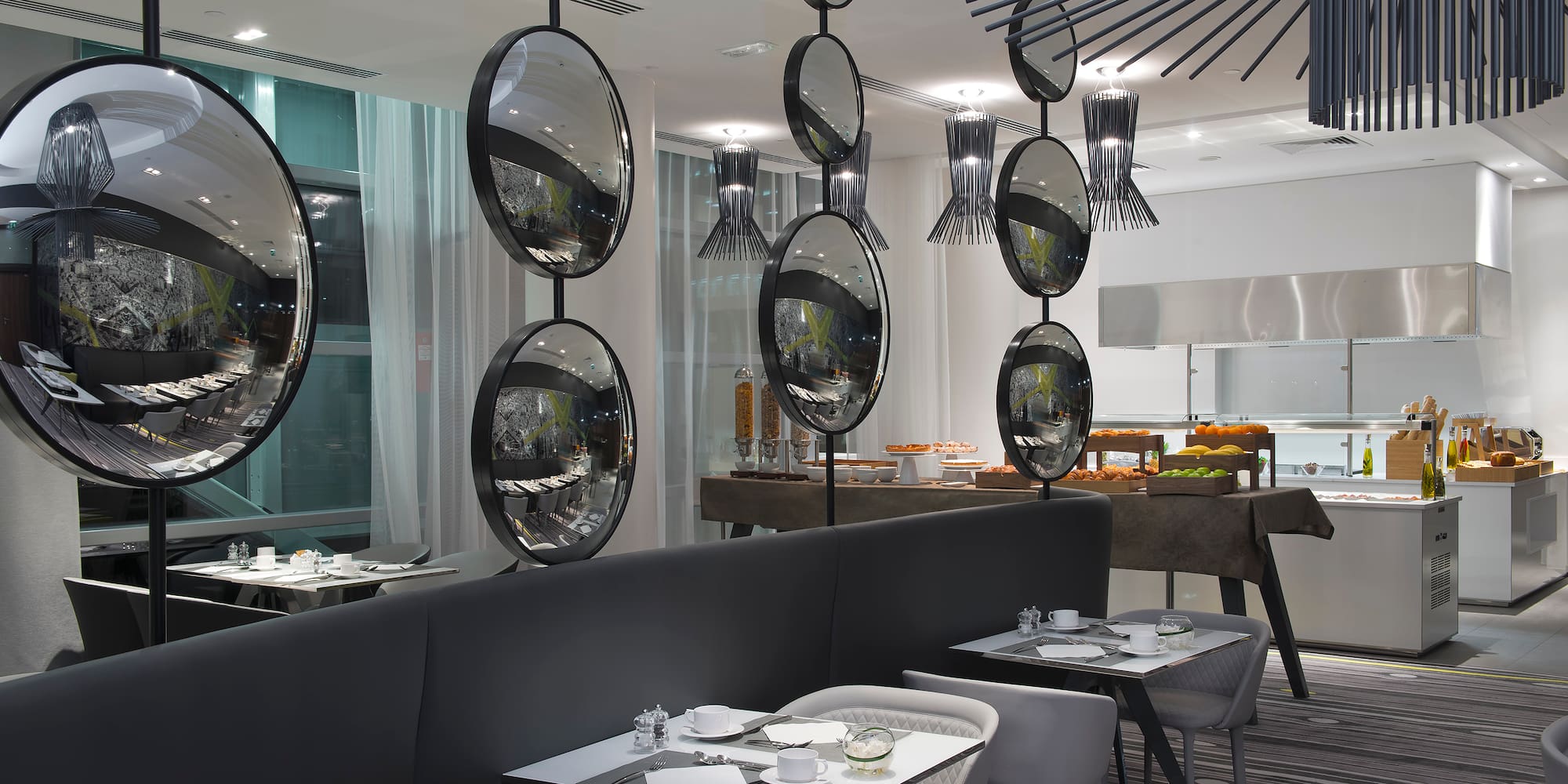 a restaurant with tables and chairs