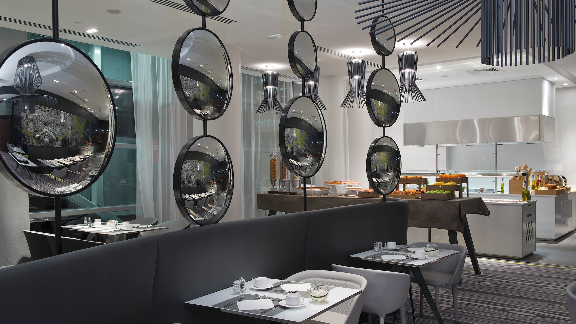 a restaurant with tables and chairs