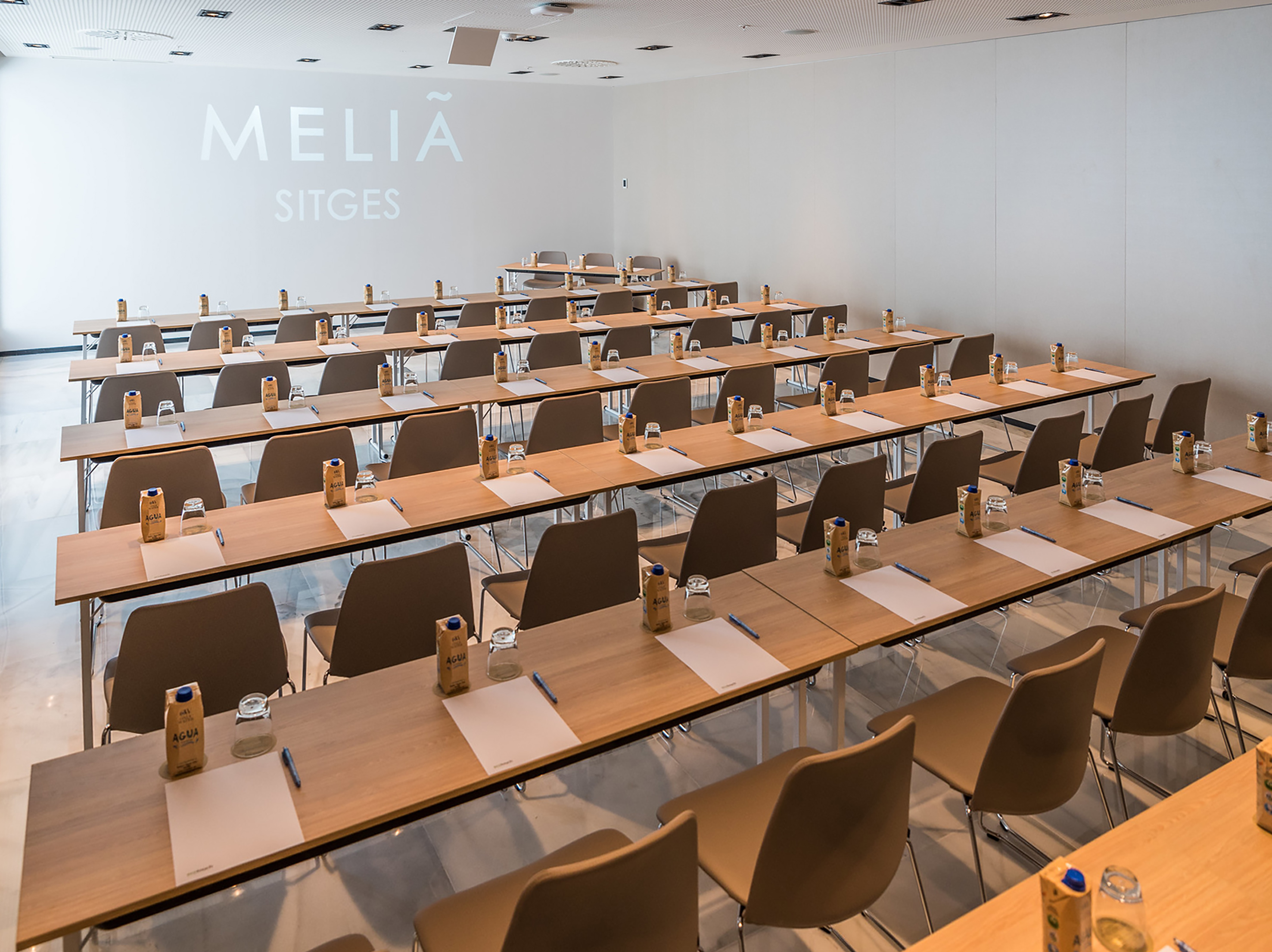 a room with tables and chairs