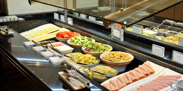 a buffet line of food