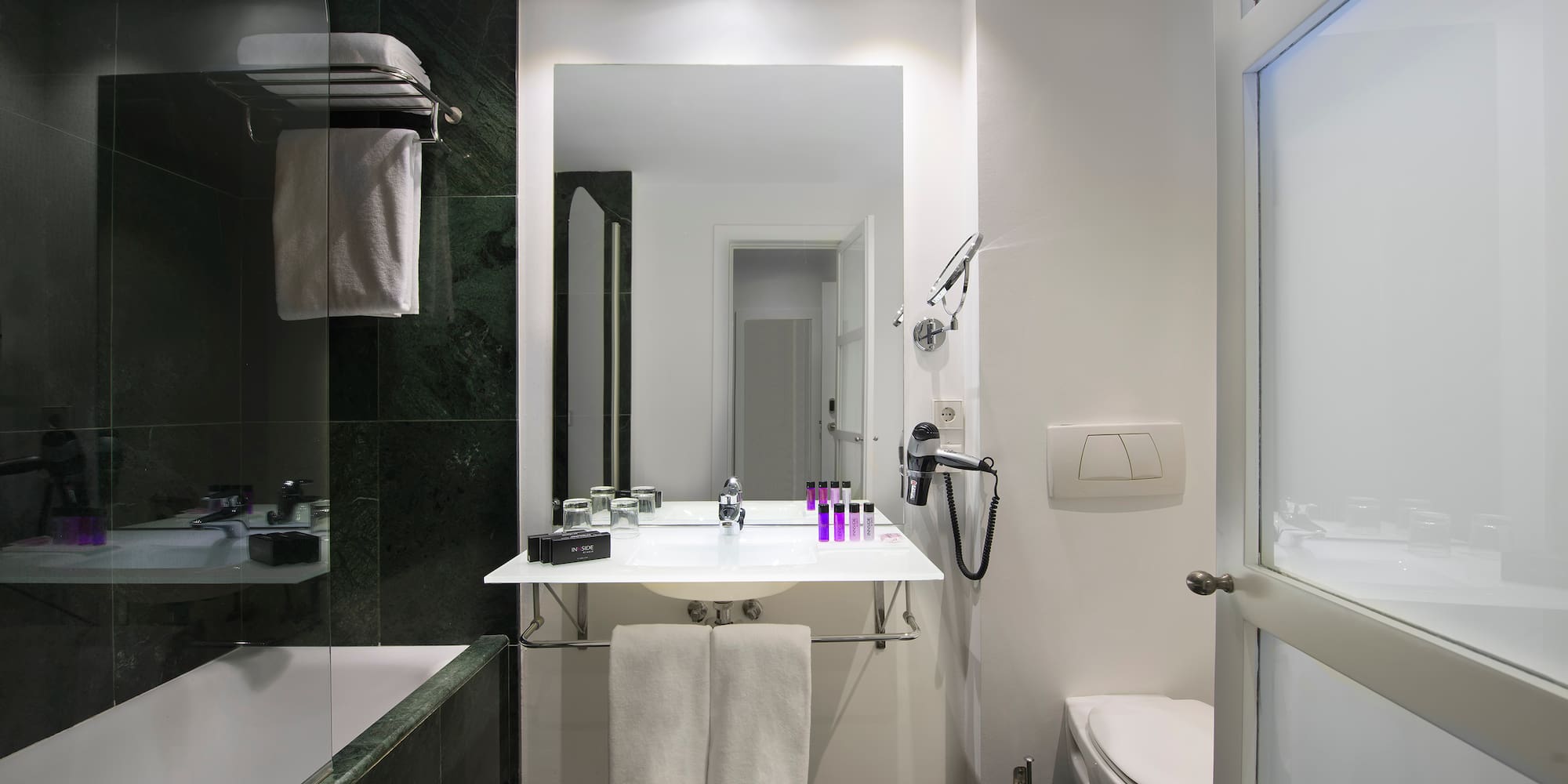 a bathroom with a sink and toilet