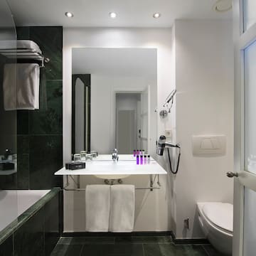 a bathroom with a sink and toilet