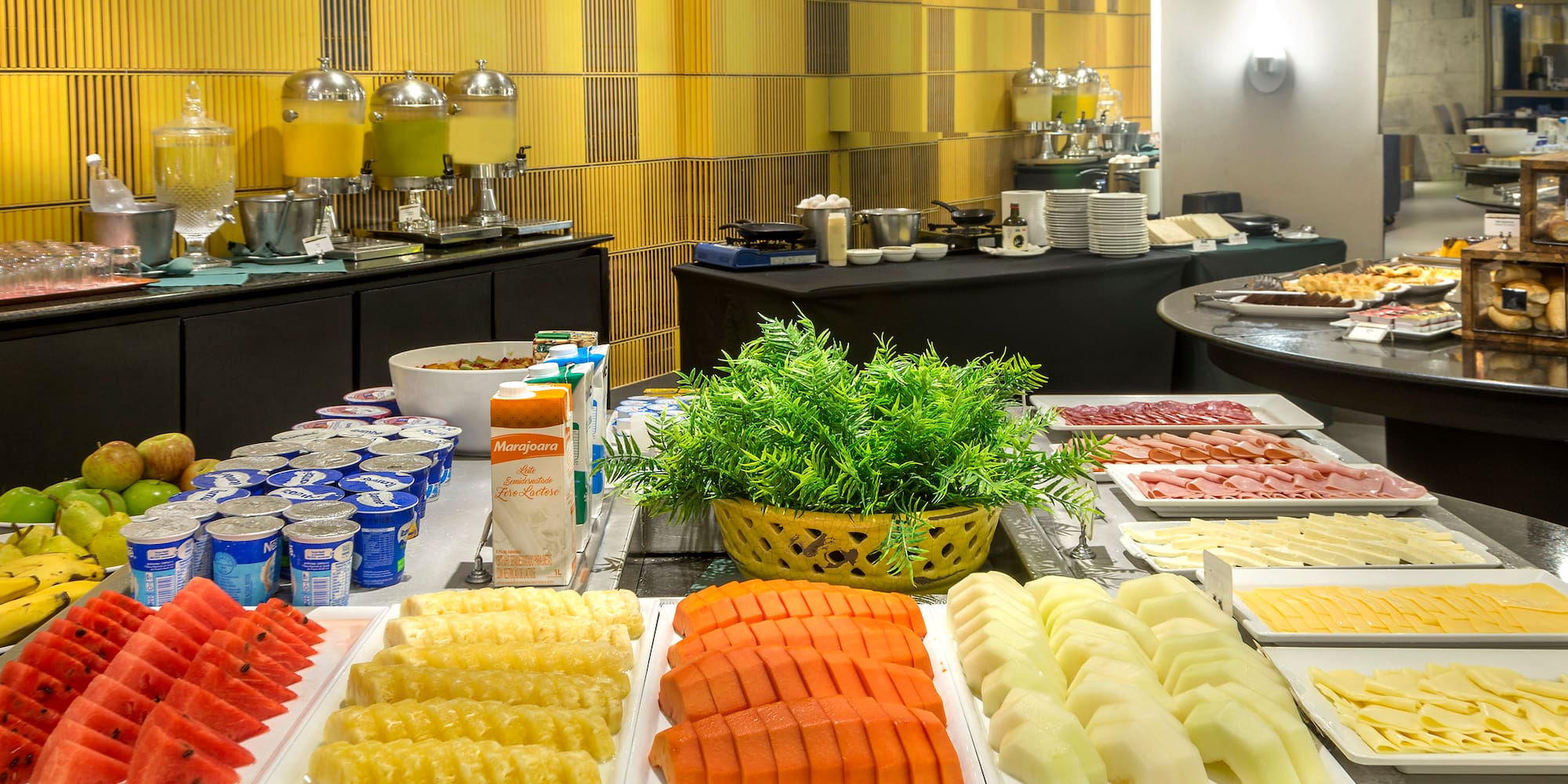a buffet table with different types of food