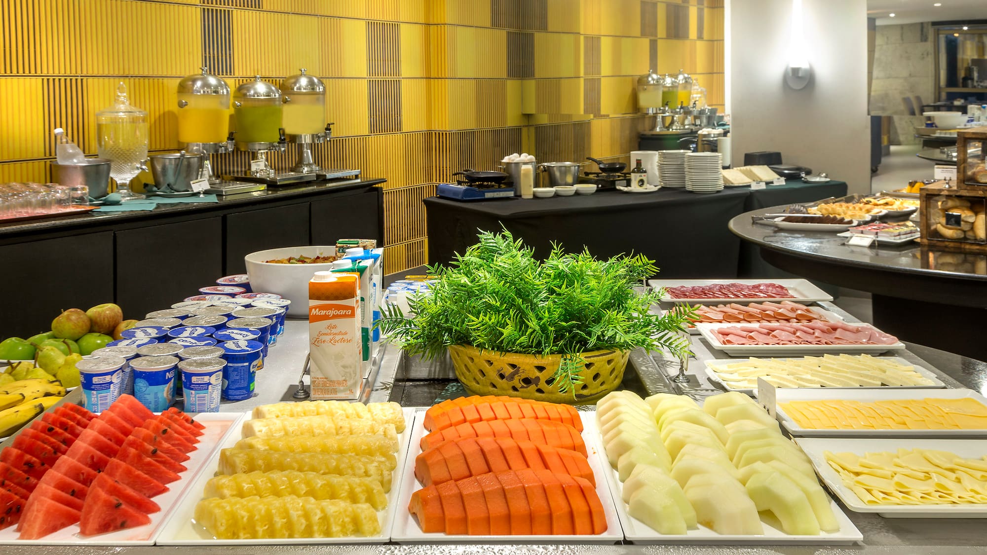 a buffet table with different types of food