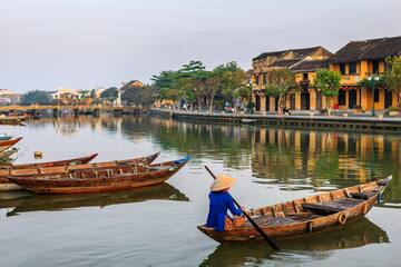 a person in a boat on a river