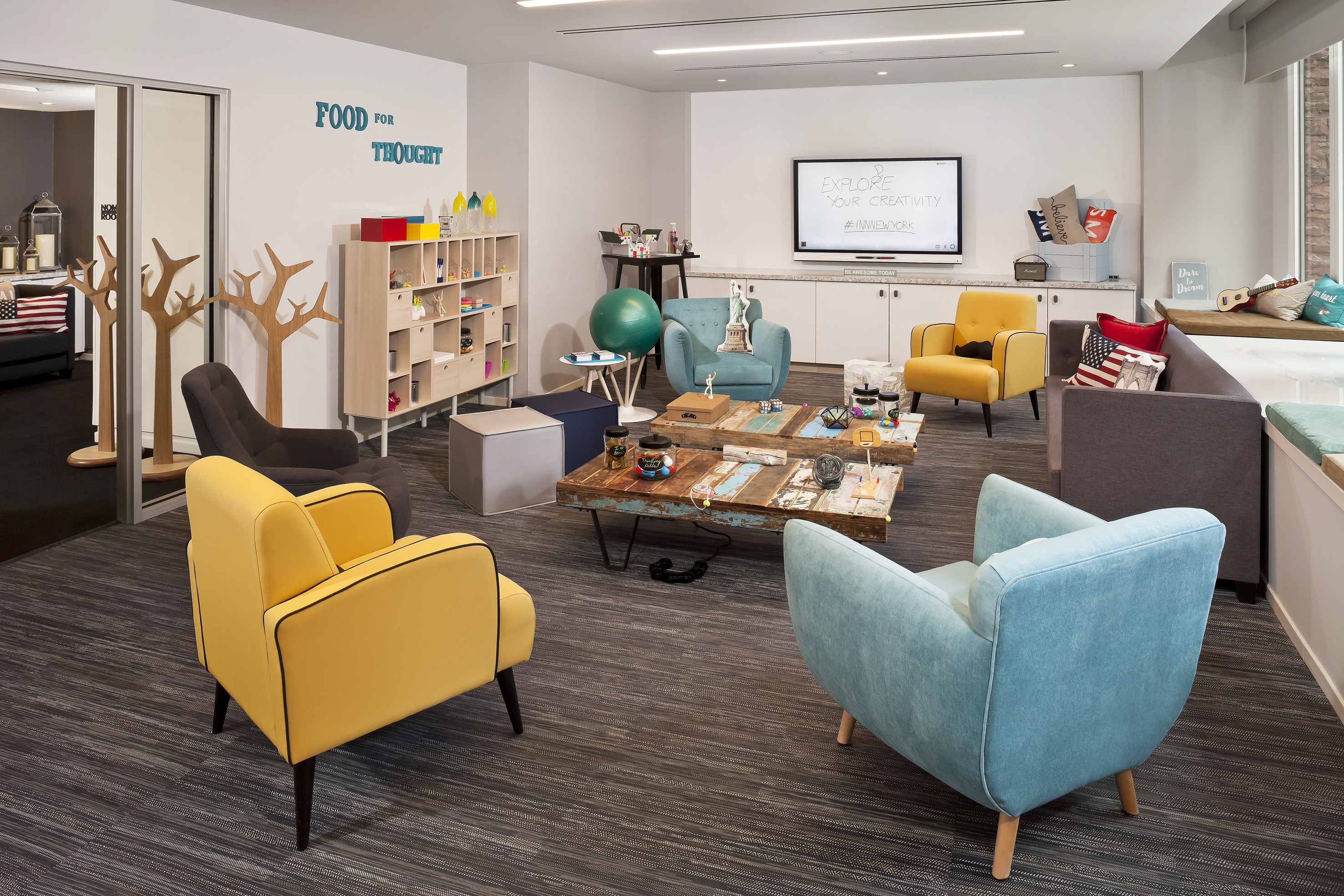 a room with chairs and a table