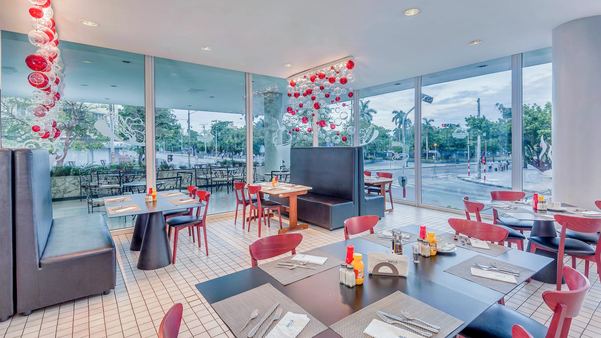 a restaurant with tables and chairs