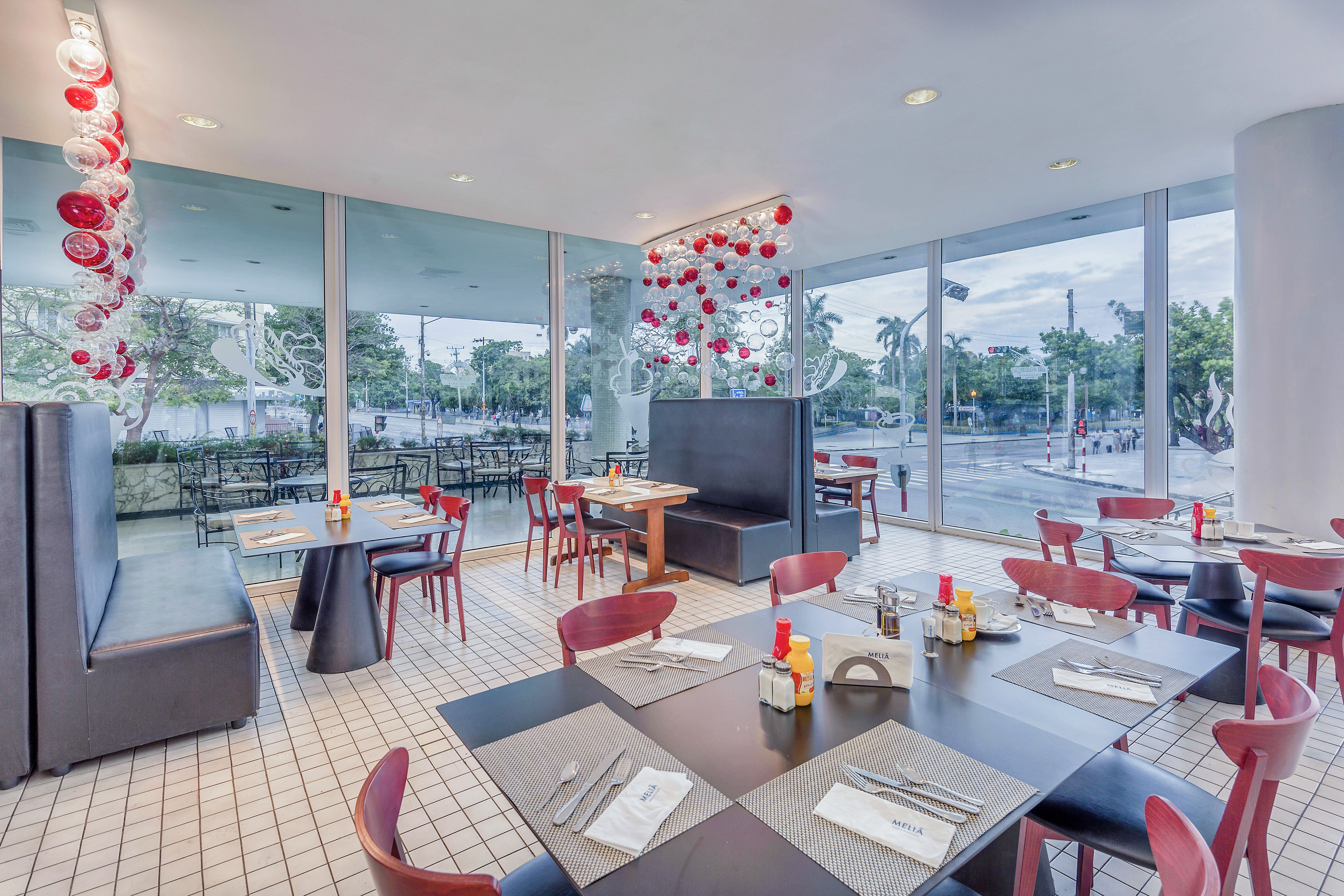 a restaurant with tables and chairs