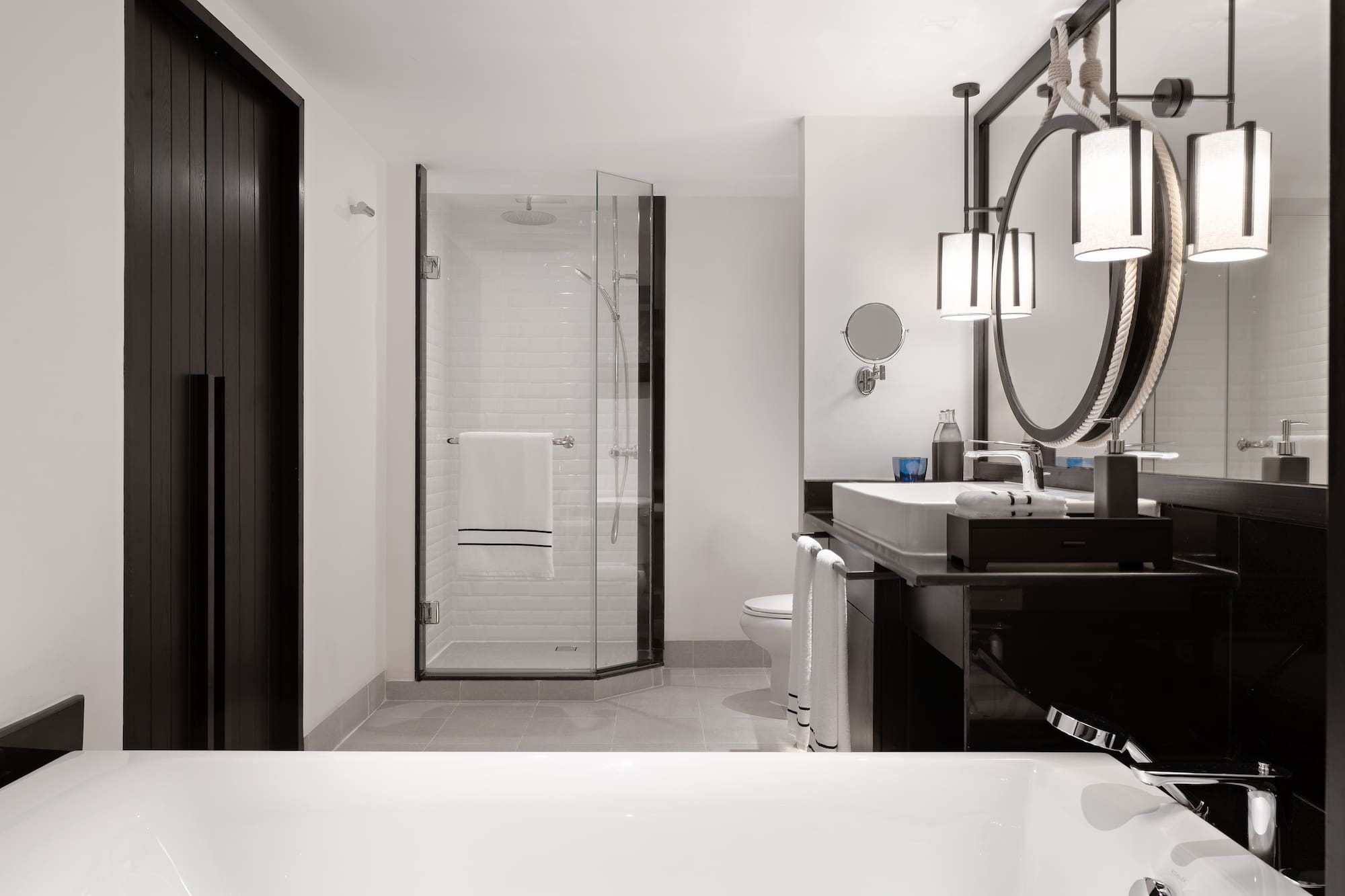 a bathroom with a mirror and a sink