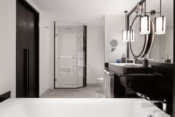 a bathroom with a mirror and a sink