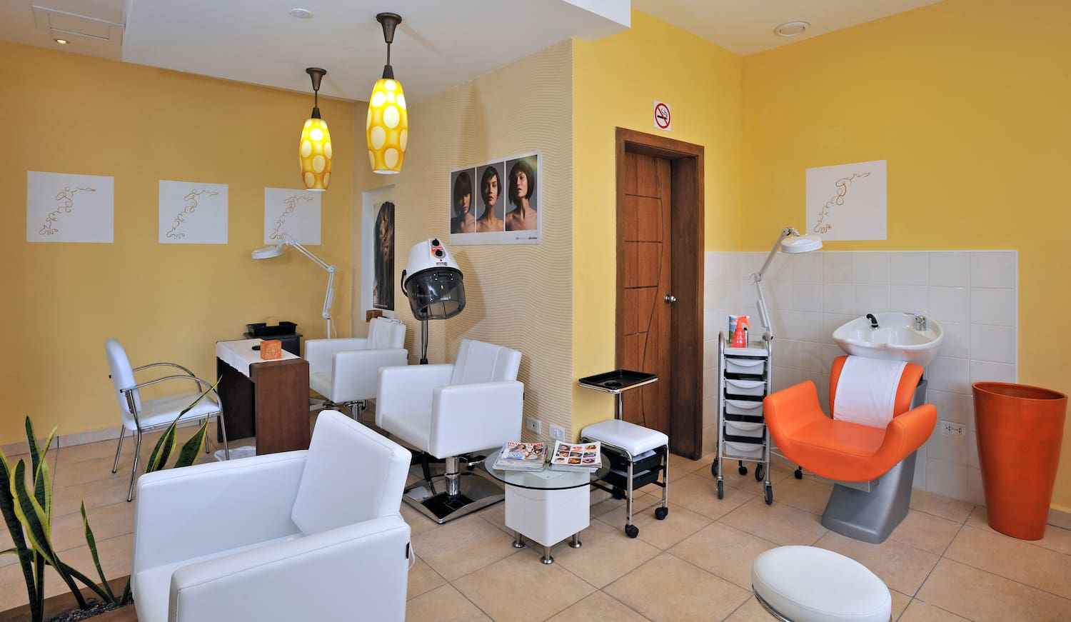 a room with chairs and a hair dryer