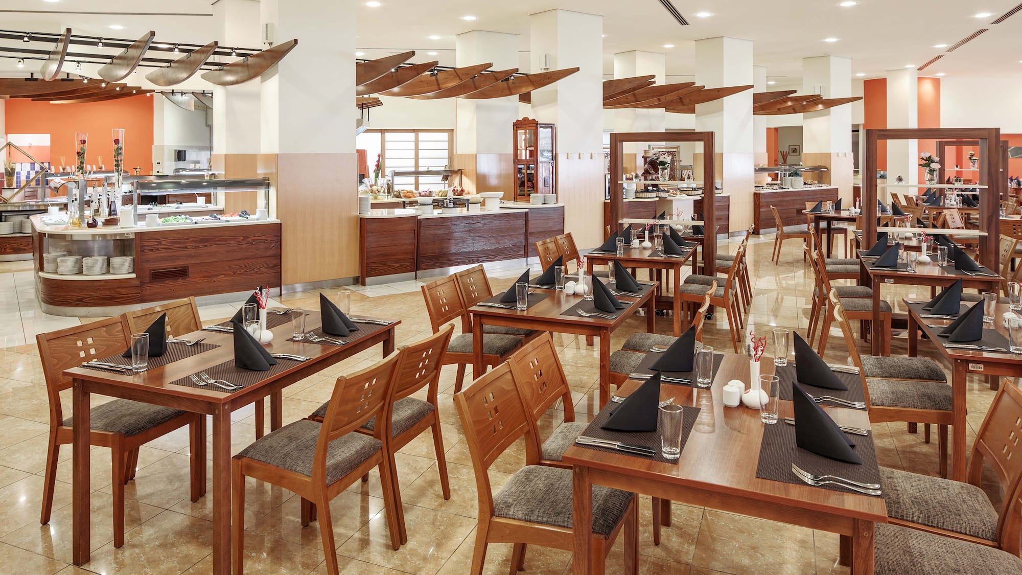 a restaurant with tables and chairs