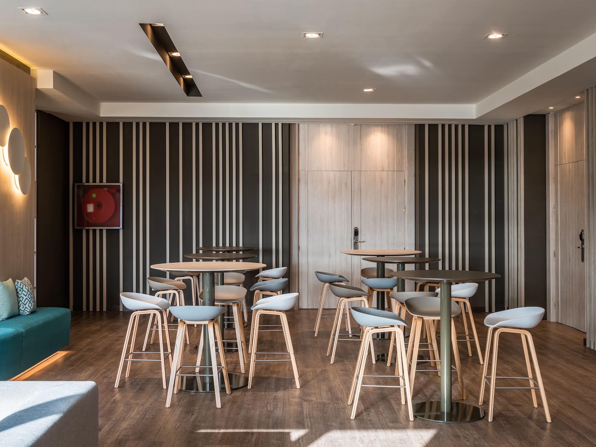 a room with tables and chairs.