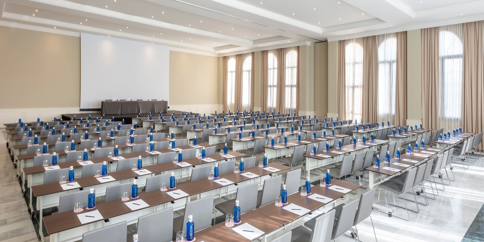 a room with tables and chairs