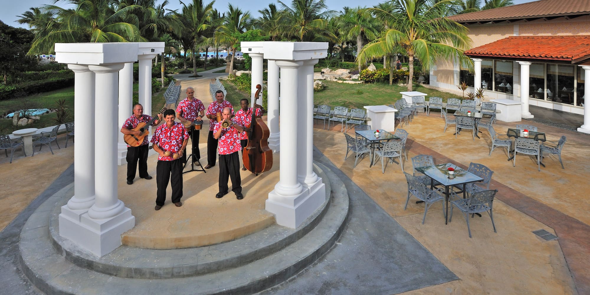 a group of men playing instruments on a stage