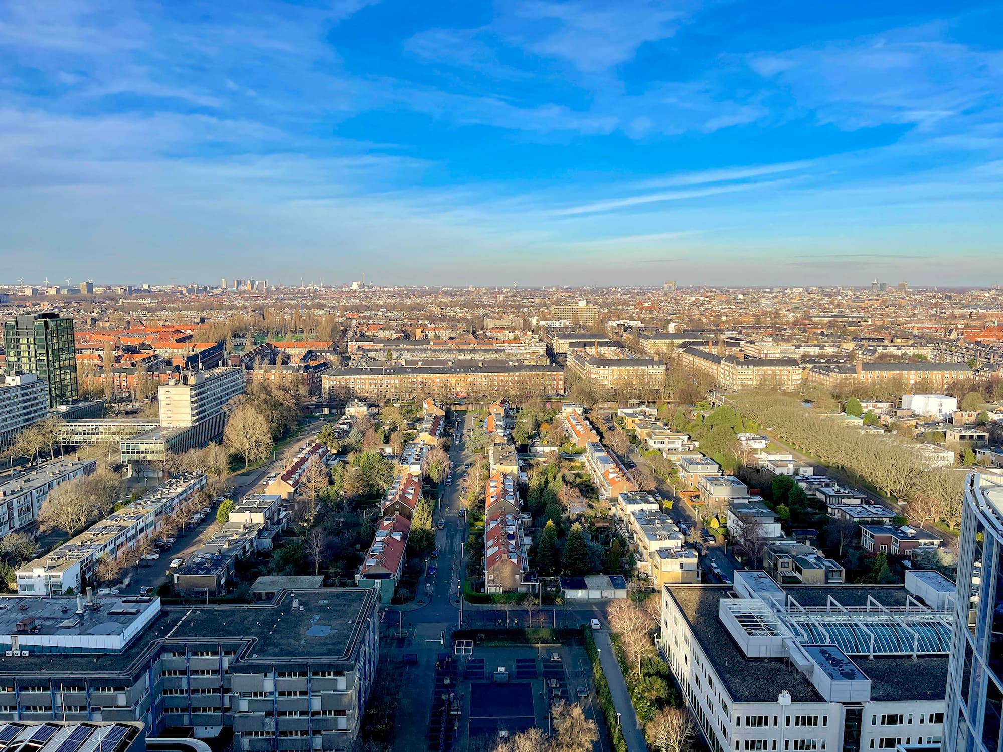 a city with many buildings and trees