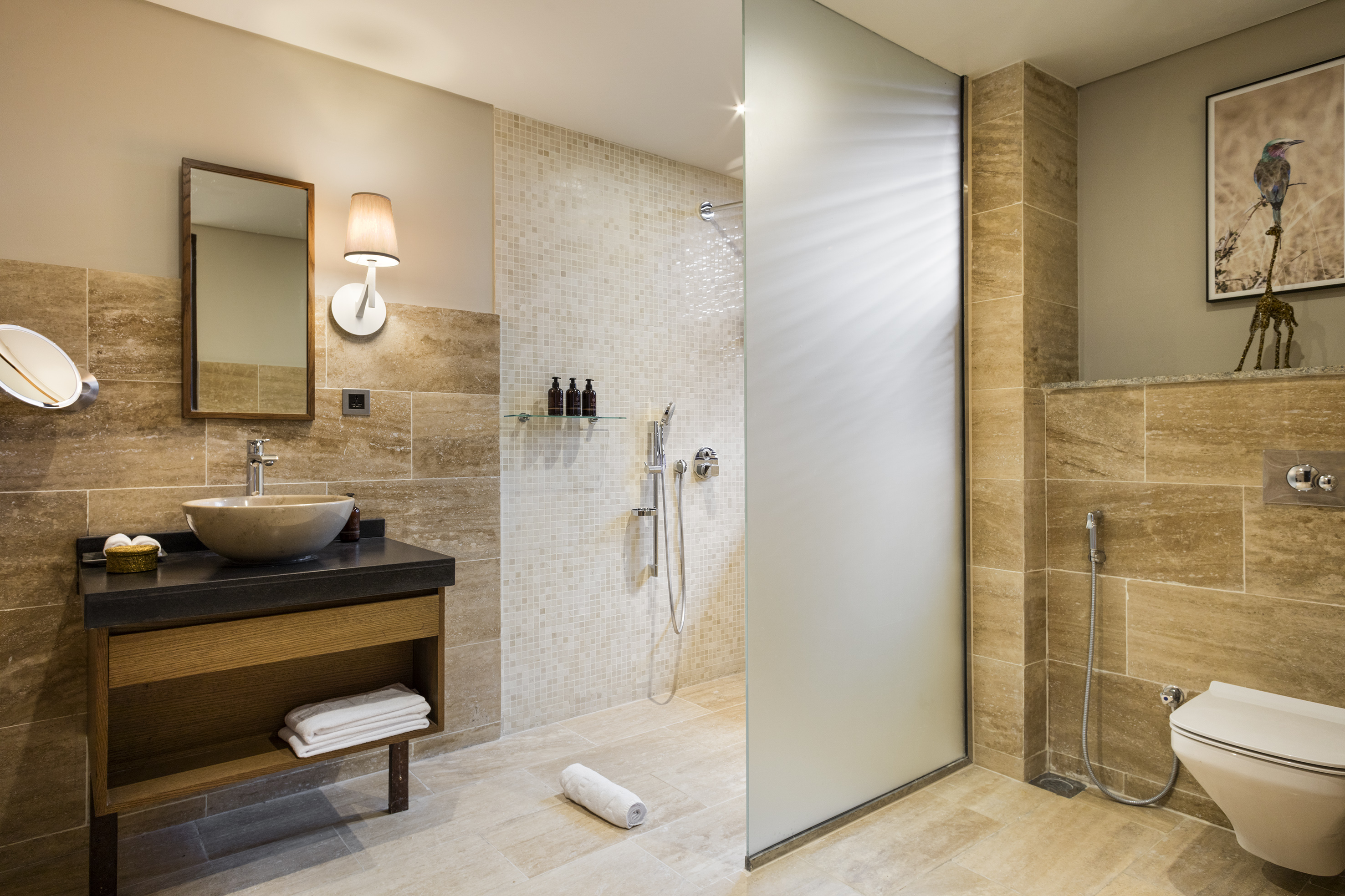 a bathroom with a shower and sink