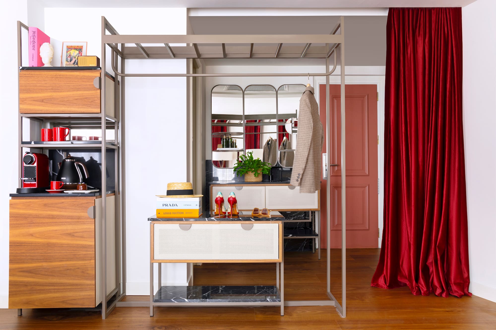 a room with a mirror and a dresser