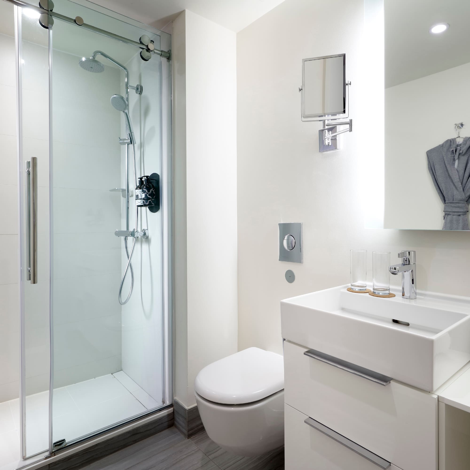 a bathroom with a shower and sink