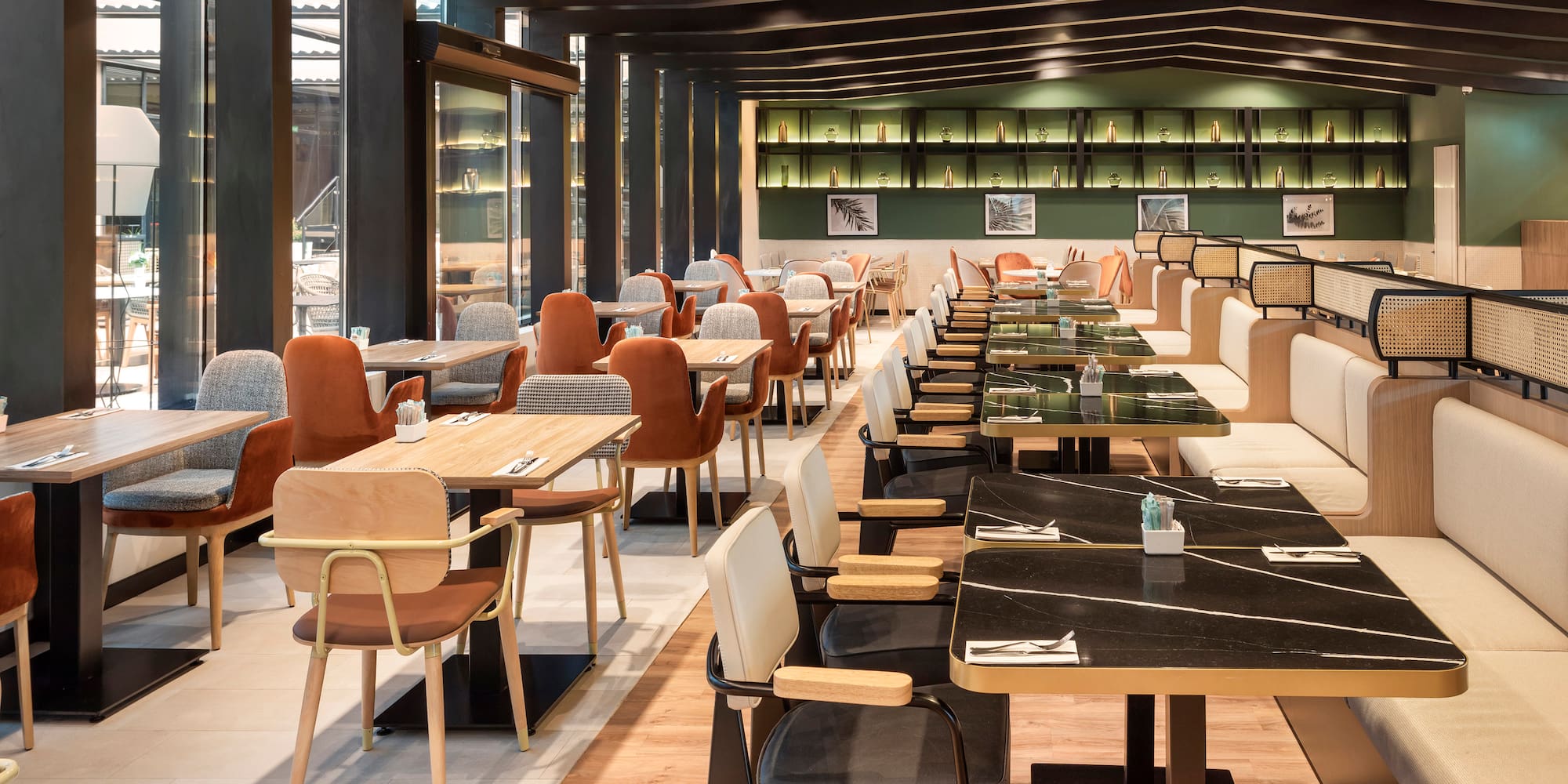 a restaurant with tables and chairs