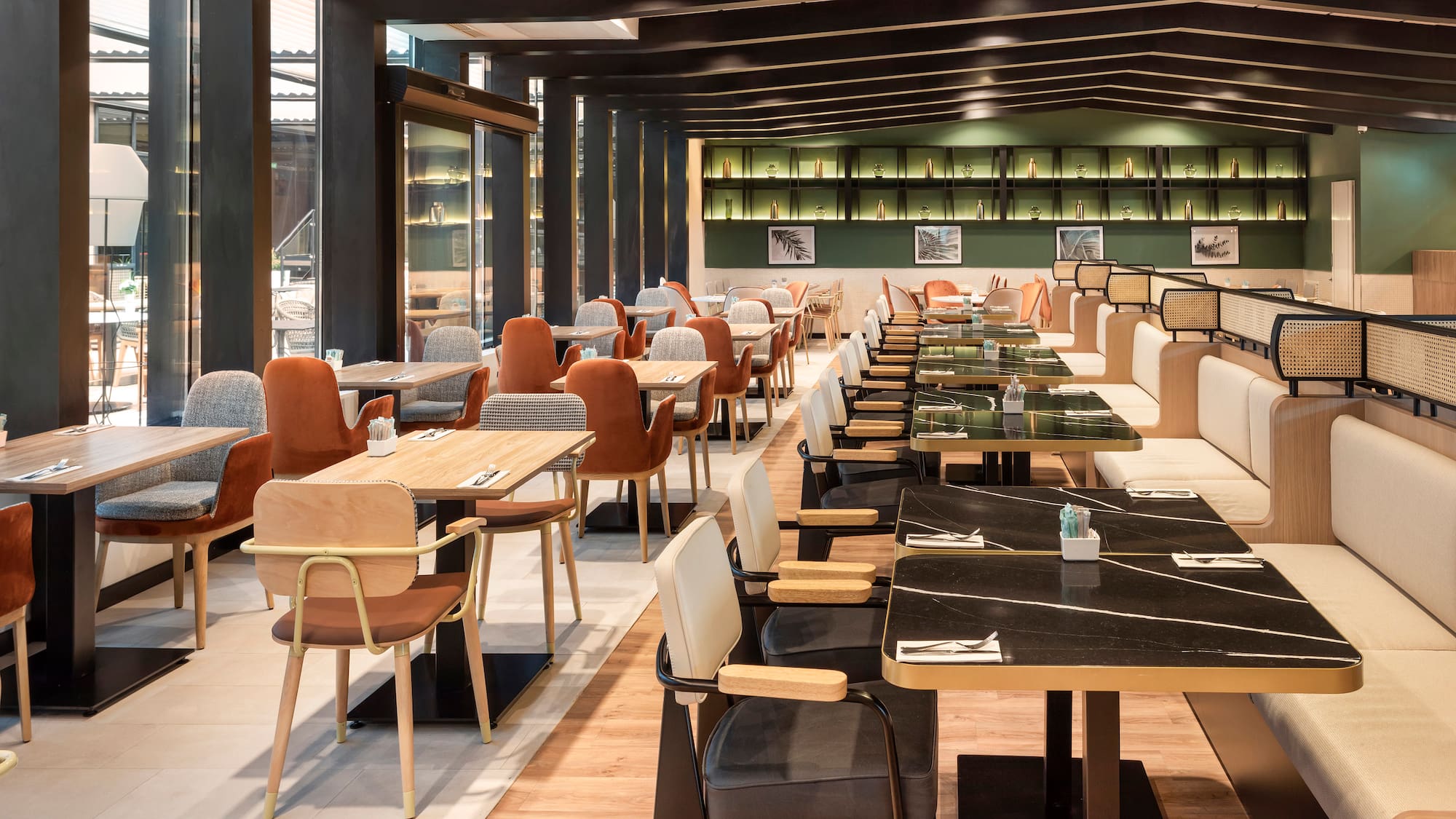 a restaurant with tables and chairs