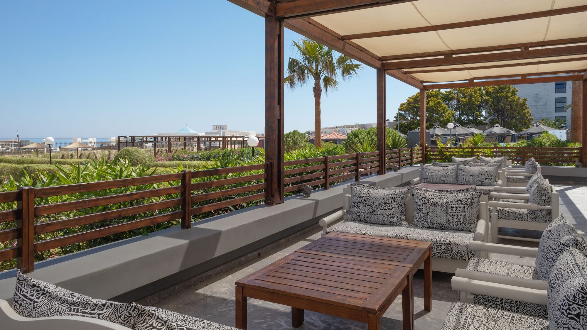 a patio with a table and chairs