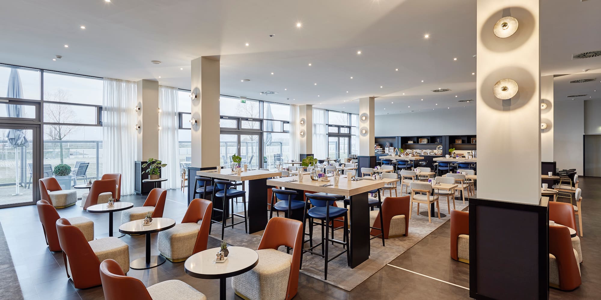 a room with tables and chairs