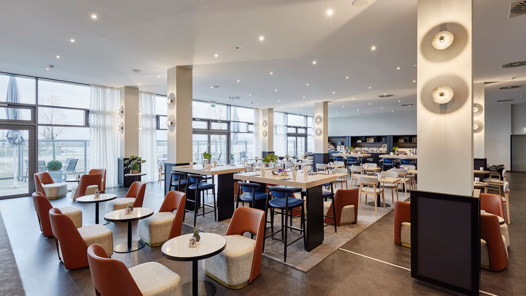 a room with tables and chairs