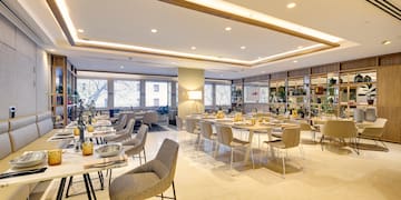 a room with tables and chairs