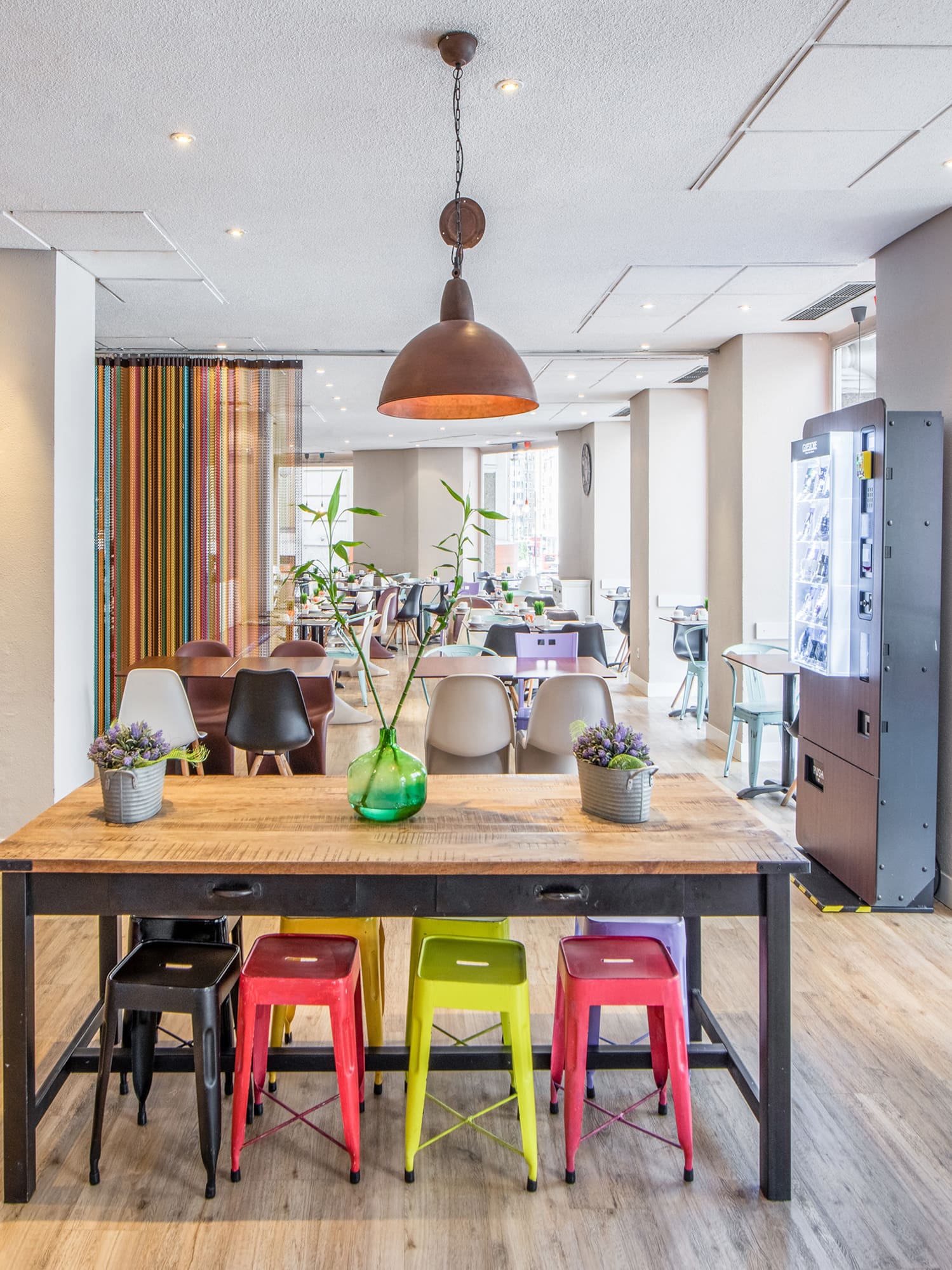 a room with a table and chairs