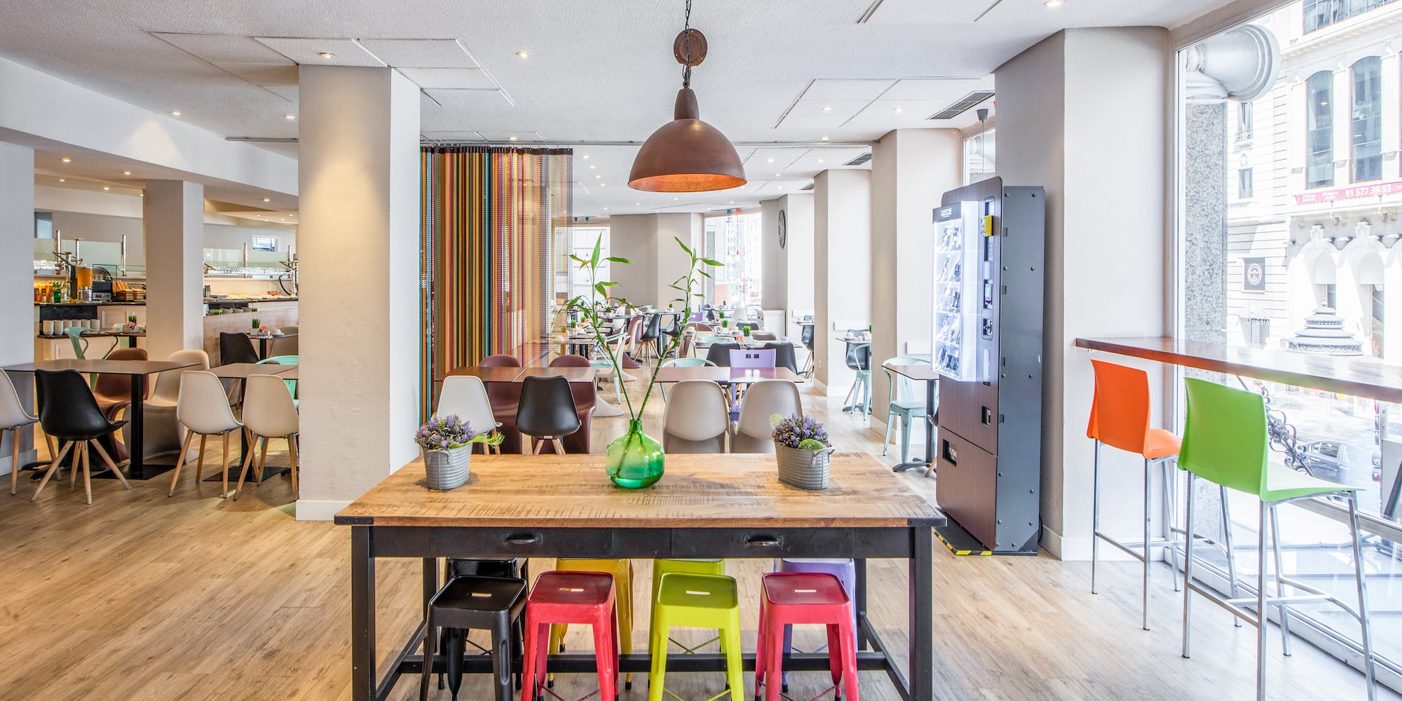 a room with a table and chairs