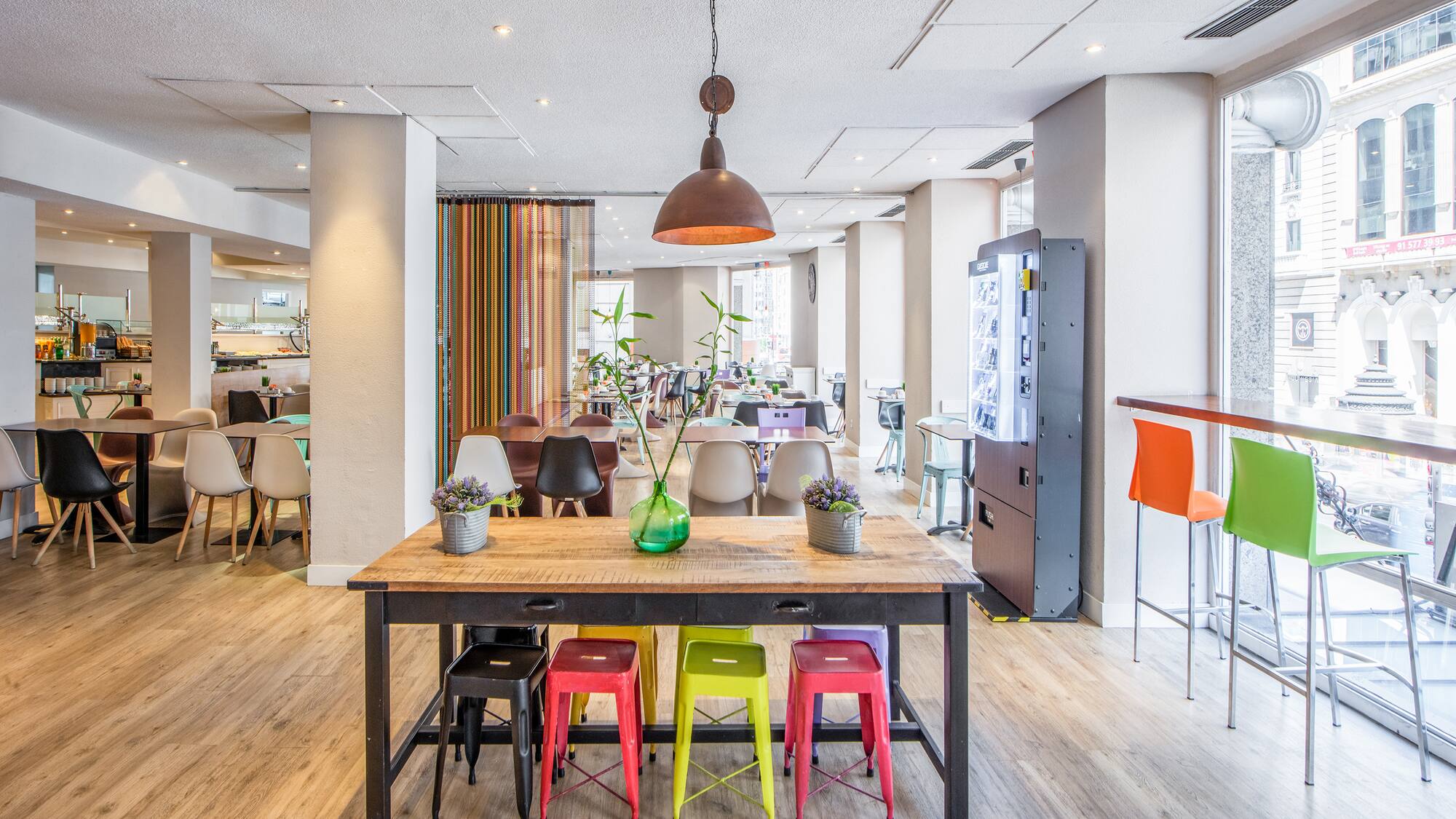 a room with a table and chairs