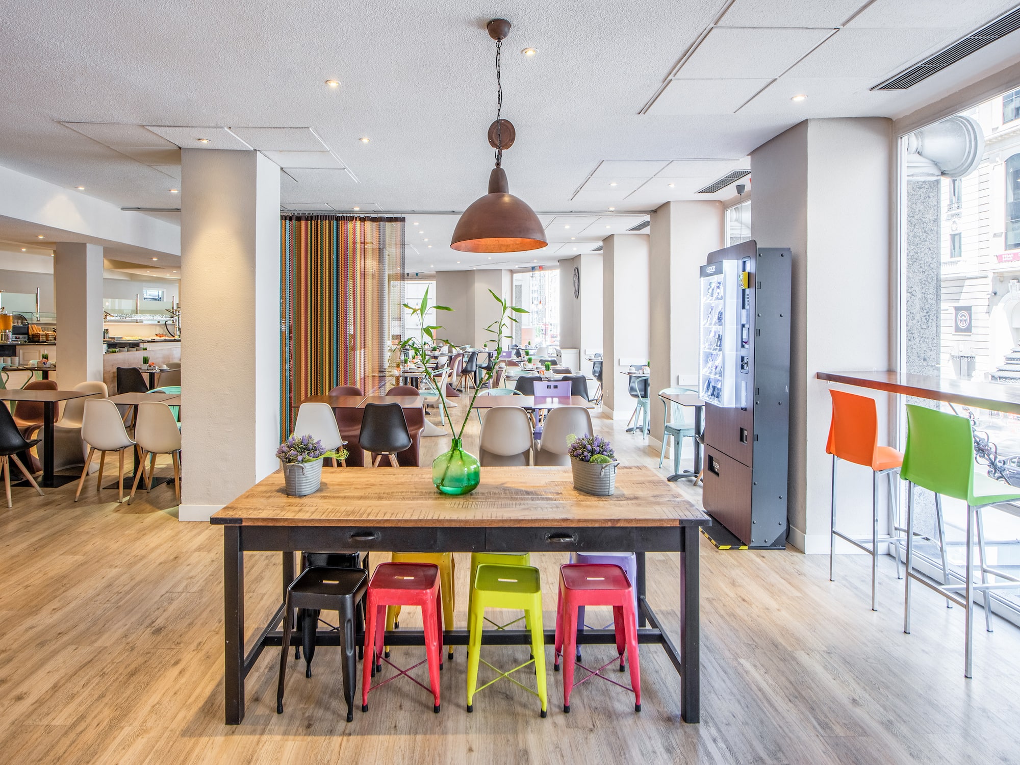 a room with a table and chairs