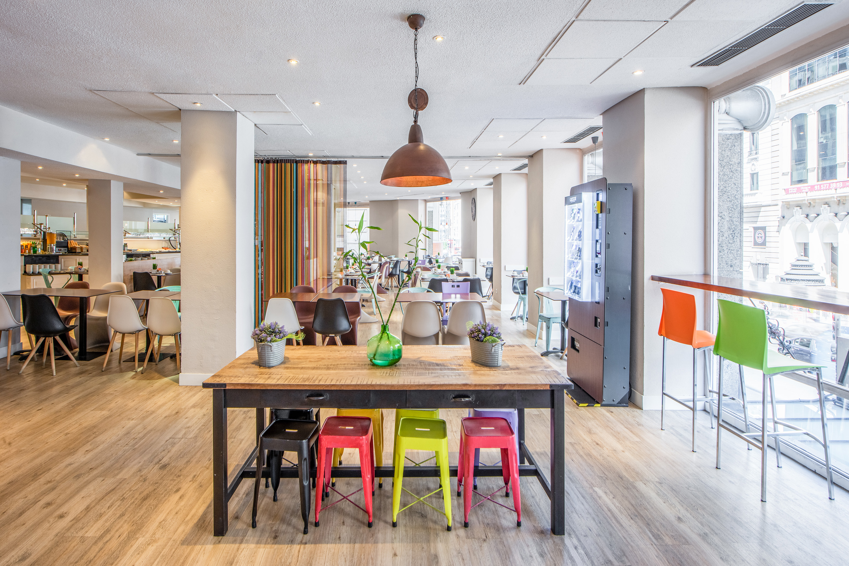 a room with a table and chairs