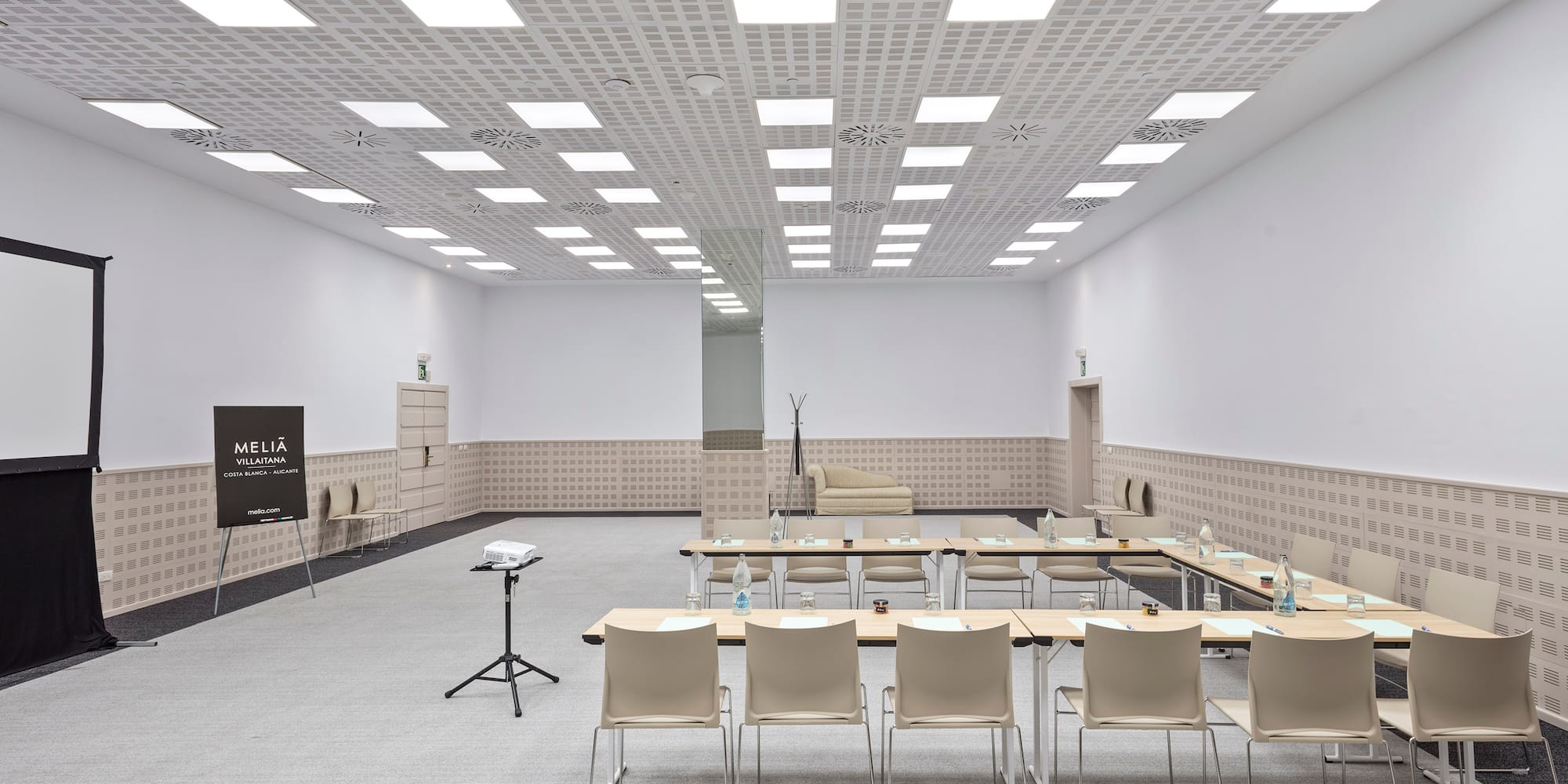 a room with a table and chairs