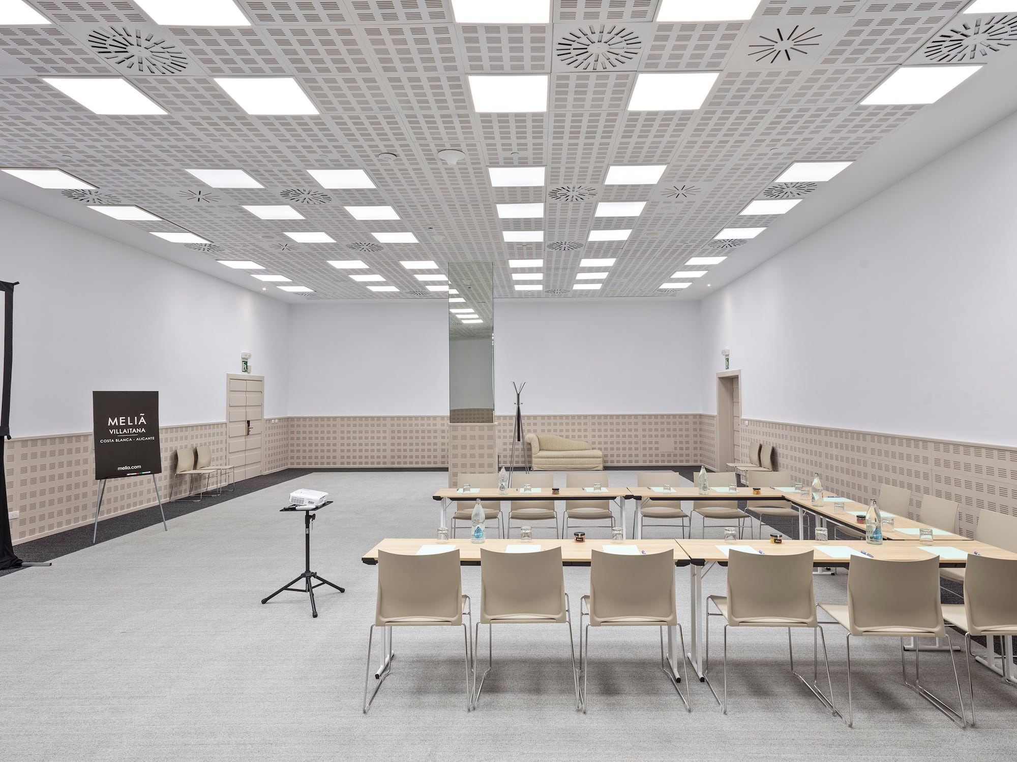 a room with a table and chairs