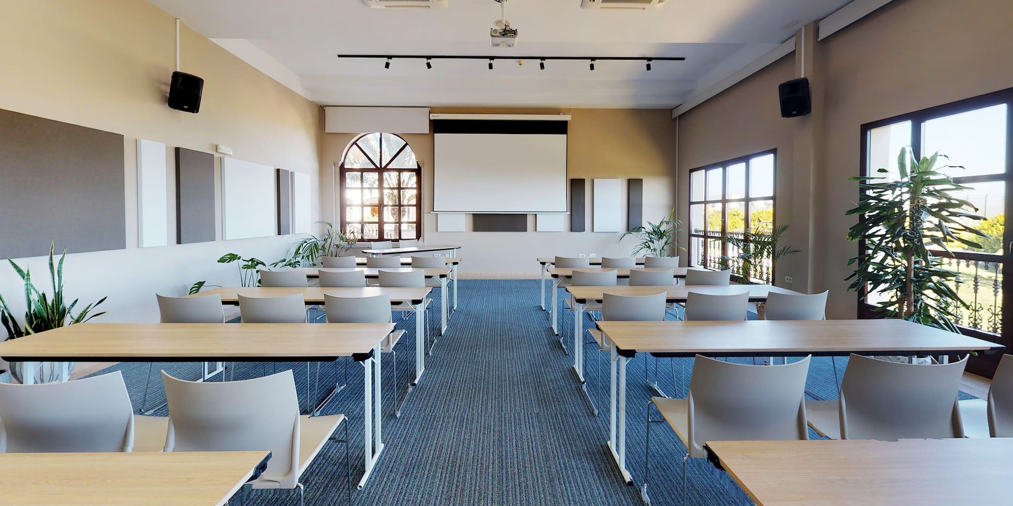 a room with tables and chairs