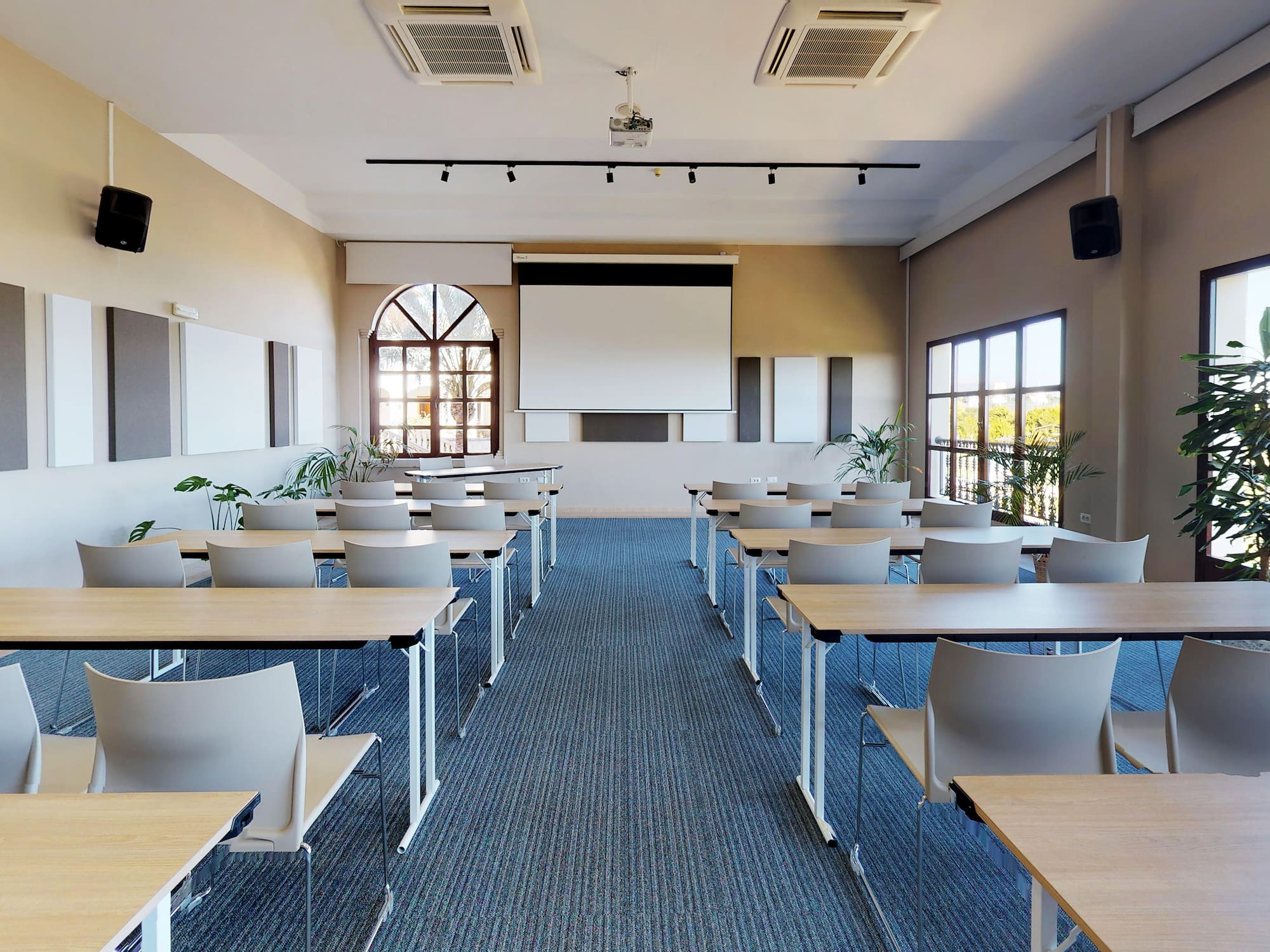 a room with tables and chairs