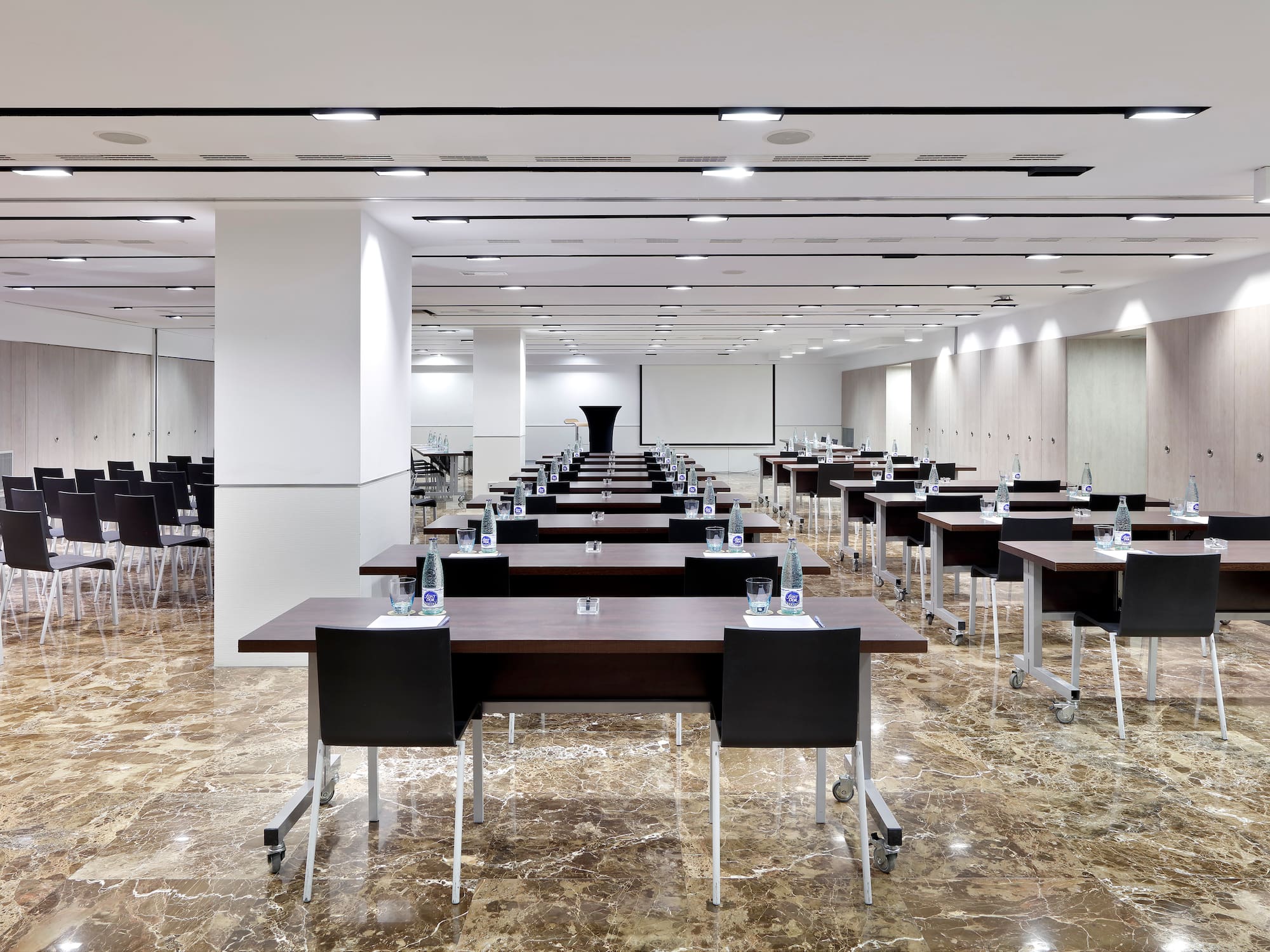 a room with tables and chairs