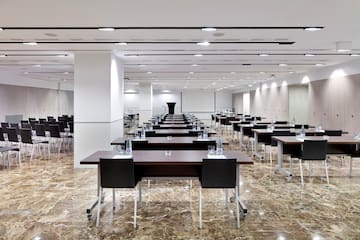 a room with tables and chairs