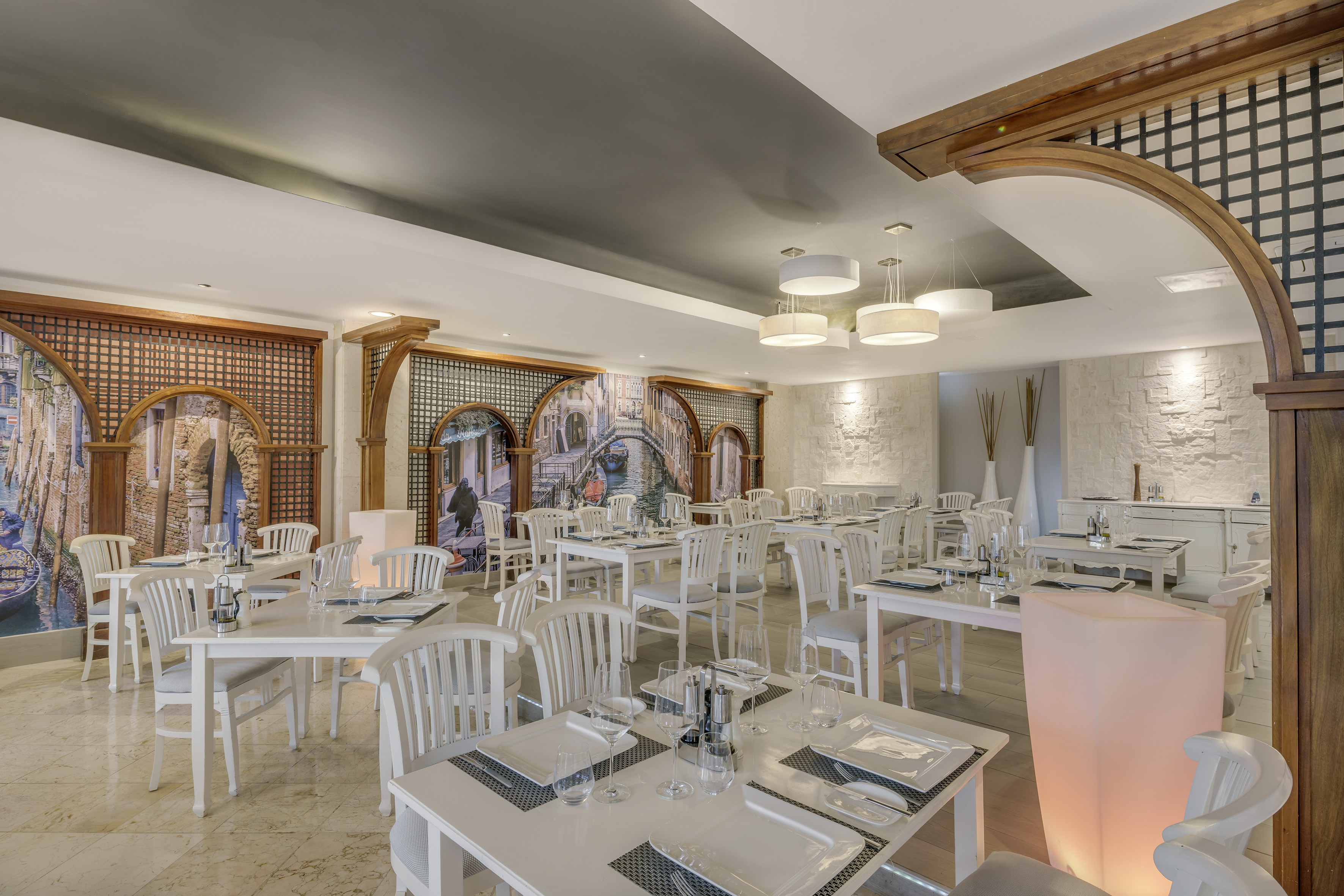 a room with tables and chairs