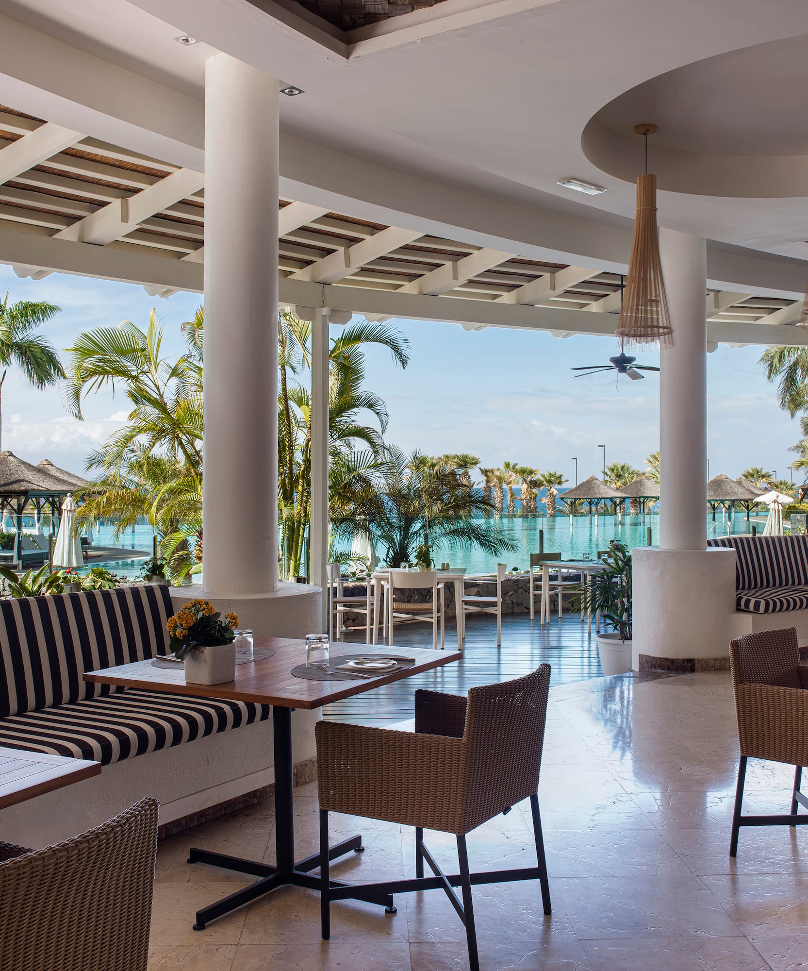 a restaurant with tables and chairs